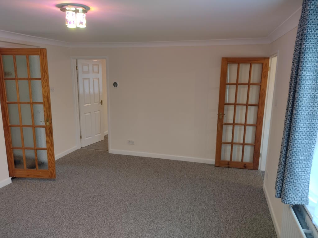 Picture of a an empty lounge in a flat